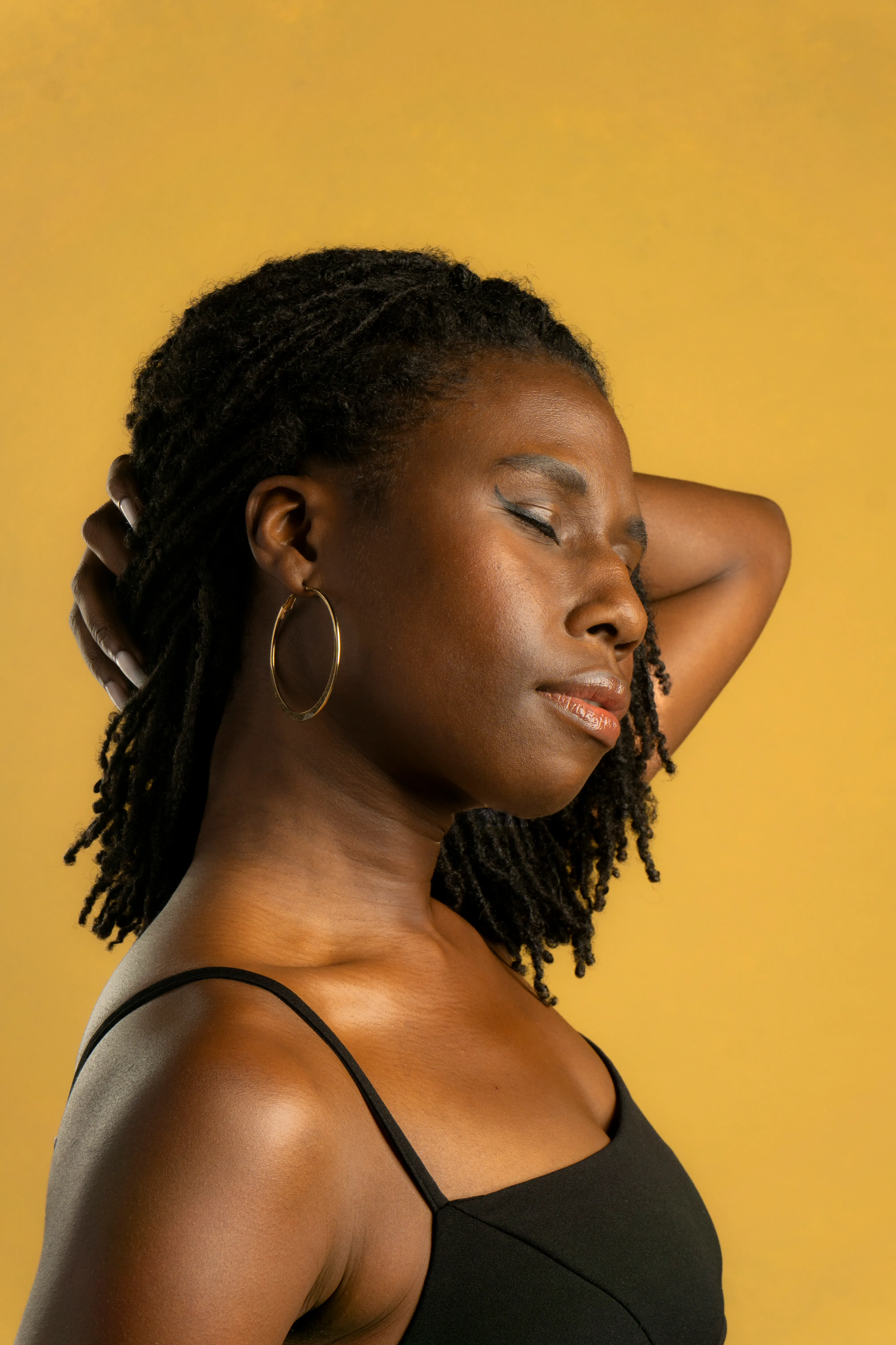 Nala in profile, eyes closed, studio portrait